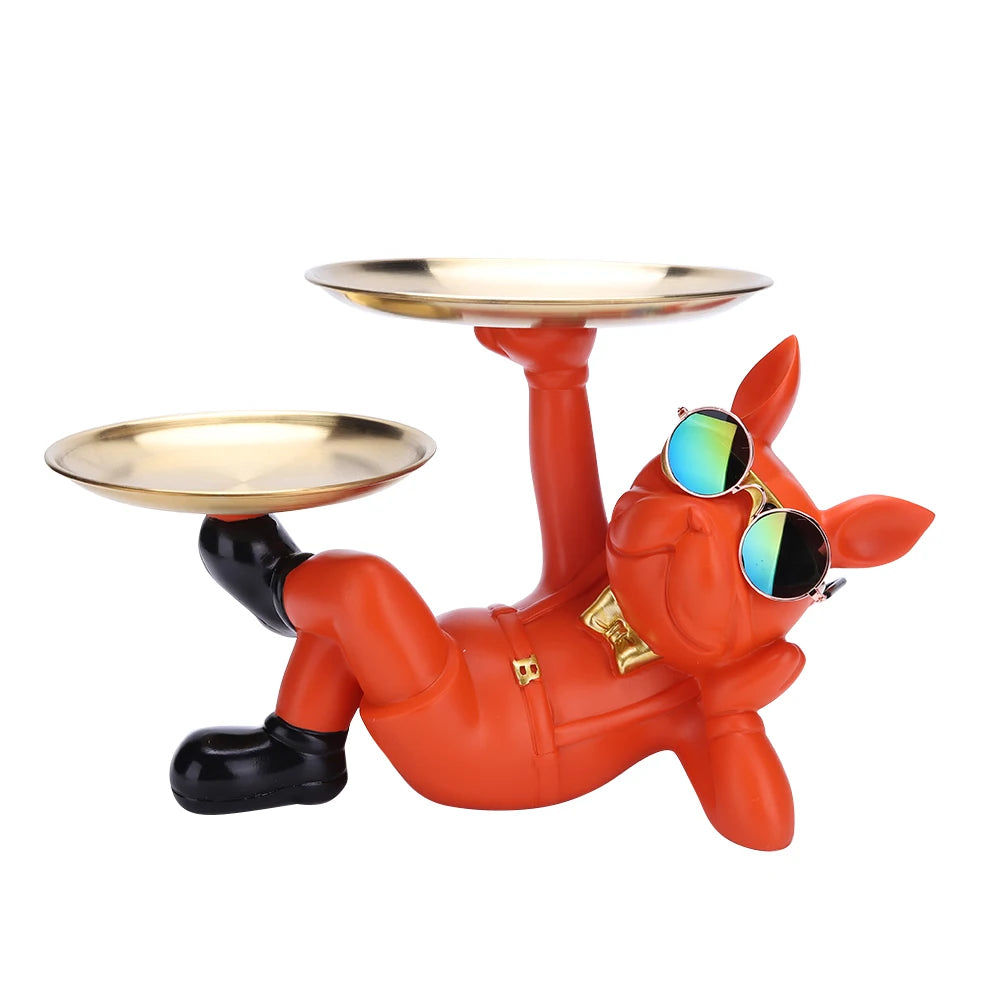 Sculpture chien design orange en pose chill avec lunettes miroir — double plateau doré pour une déco tendance, décalée et pratique dans un intérieur pop et moderne