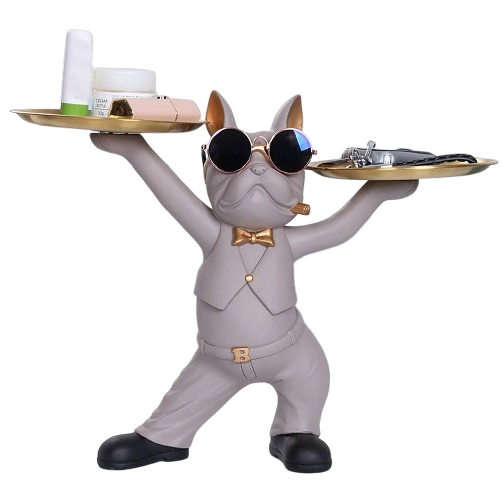 Sculpture décorative de chien majordome beige avec lunettes et plateaux dorés — un accessoire original et pratique pour sublimer une entrée, une console ou un salon moderne
