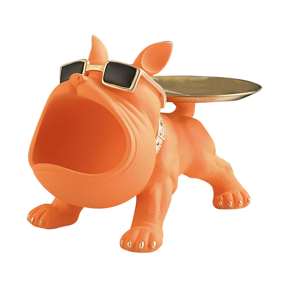 Sculpture décorative bulldog orange avec lunettes et double plateau porte-bonbons, objet déco insolite et fonctionnel pour intérieur moderne et ludique