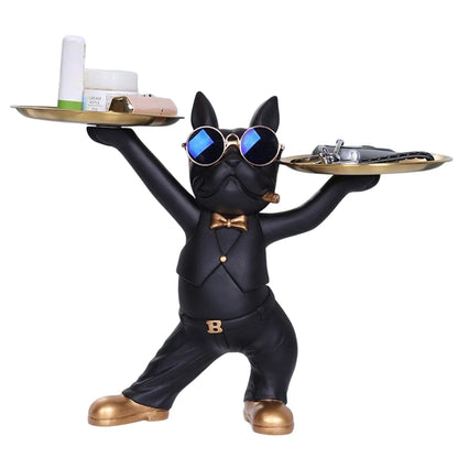 Sculpture chien majordome noir avec lunettes miroir et plateau double — un objet déco fun et chic pour organiser vos clés, bijoux ou cosmétiques avec une touche pop art décalée.