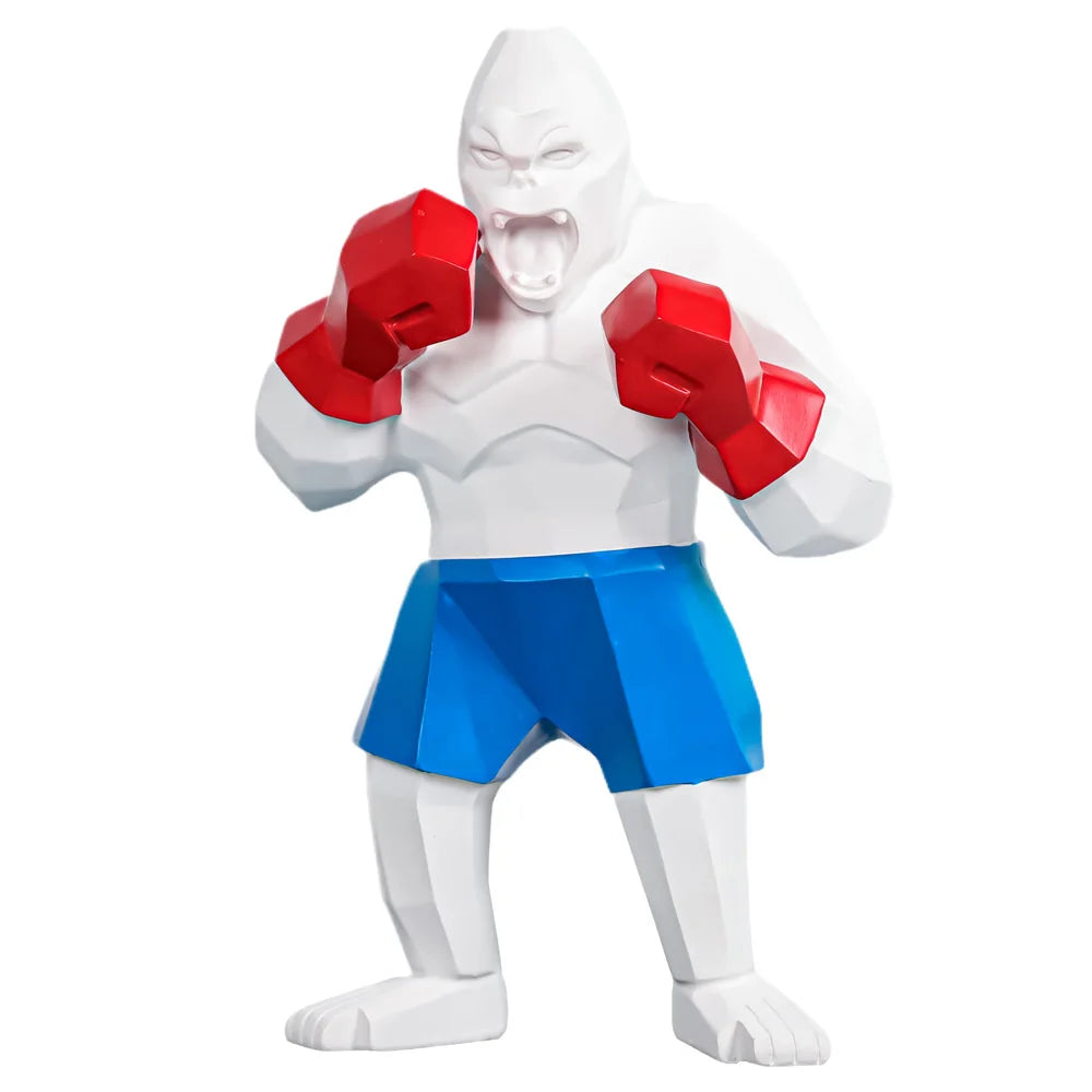 Sculpture gorille boxeur en résine blanche avec gants rouges et short bleu, déco pop art audacieuse pour intérieur moderne ou collection geek