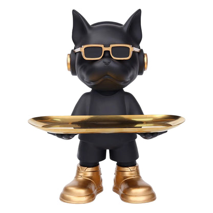 Sculpture design de chien noir avec lunettes dorées, casque audio et plateau chic — un objet déco audacieux et branché pour intérieur moderne, entre style urbain et pop art